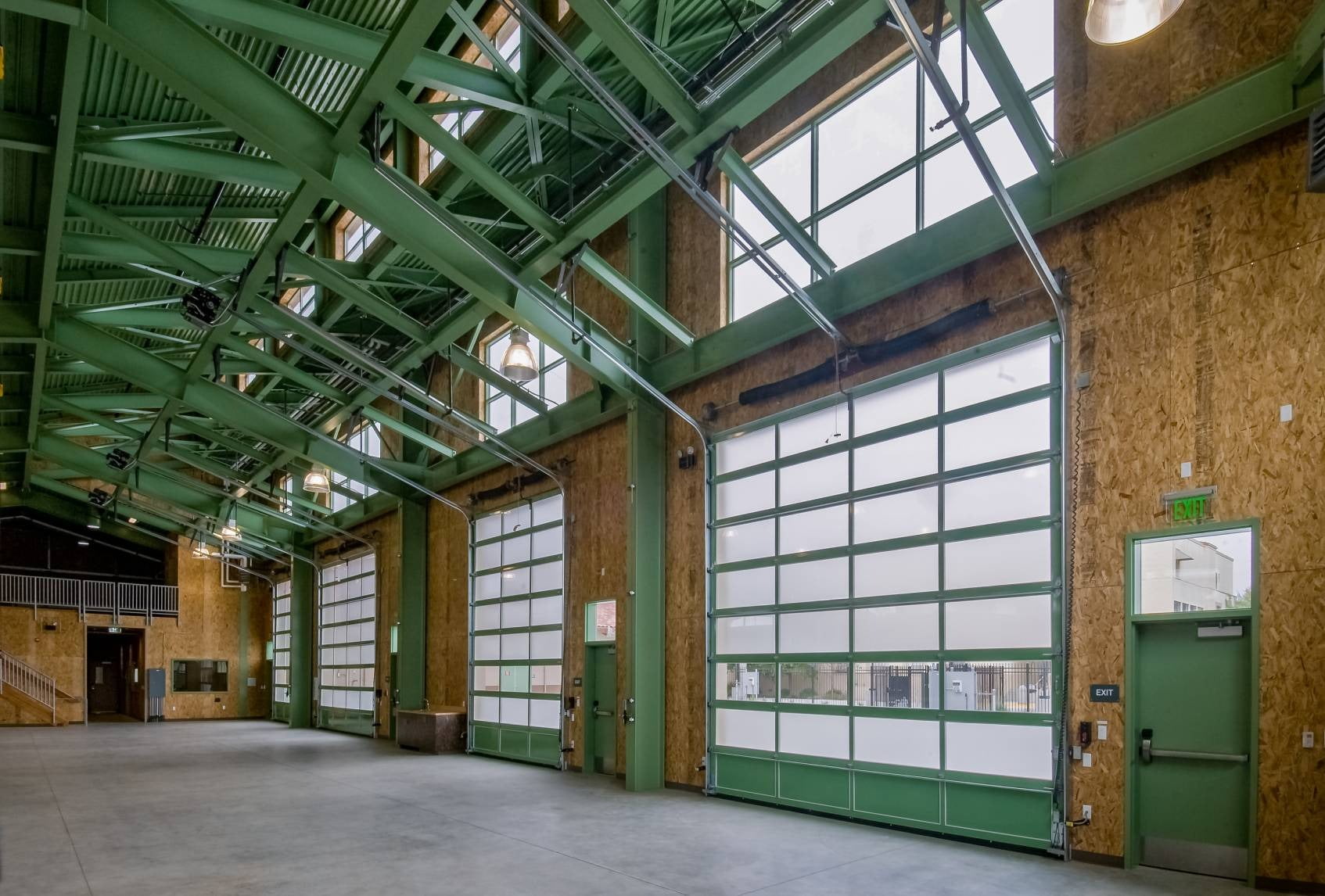 Large aluminum sliding windows in an industrial facility